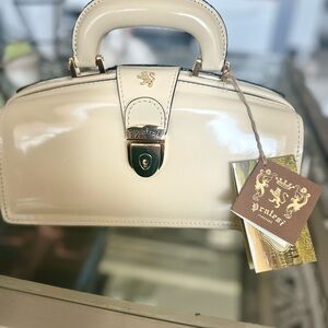 Cream Satchel with Glossy Finish and Structured Design